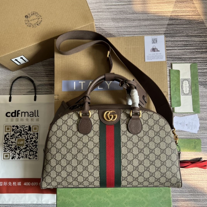G*u*i top handle bags